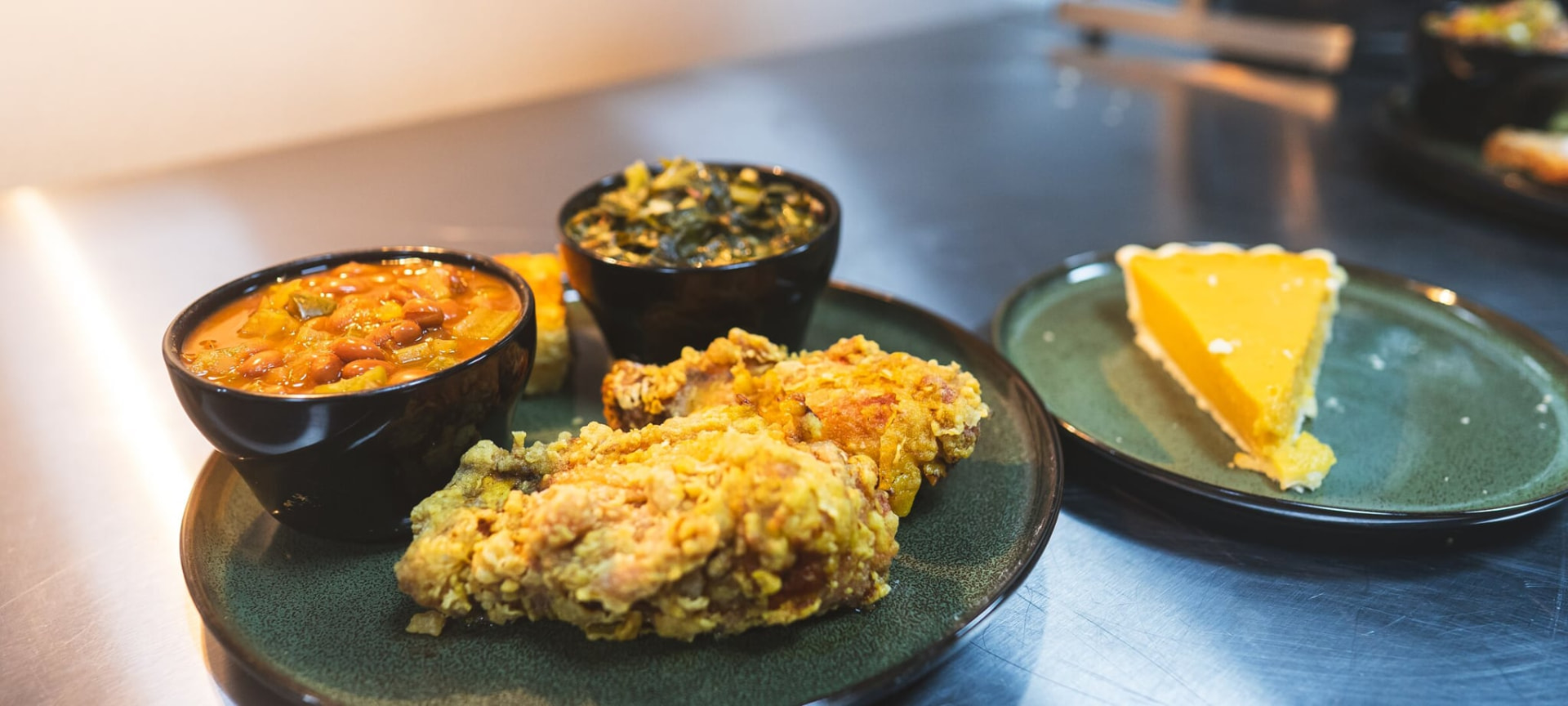 Fried chicken with beans, greens, cornbread and sweet potato pie